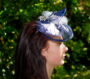 Navy Blue Fascinator with White Feather Decoration